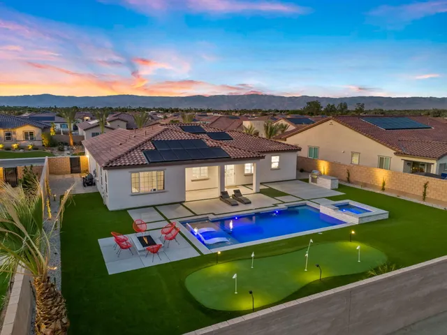a view of a yard with an outdoor space