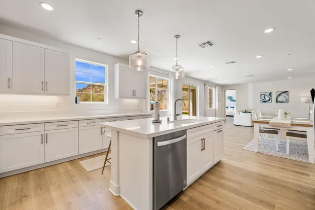 a bathroom with a sink and a window