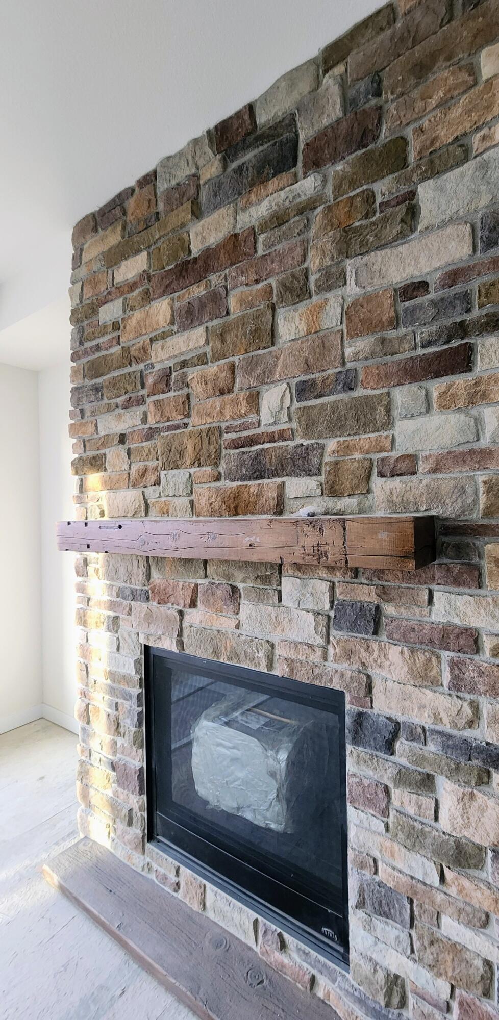 2161 Wallace Lake Road, Unit LT10 Trenton, WI 53090 - Photo 5 of 14 Floor to Ceiling Stone Fireplace