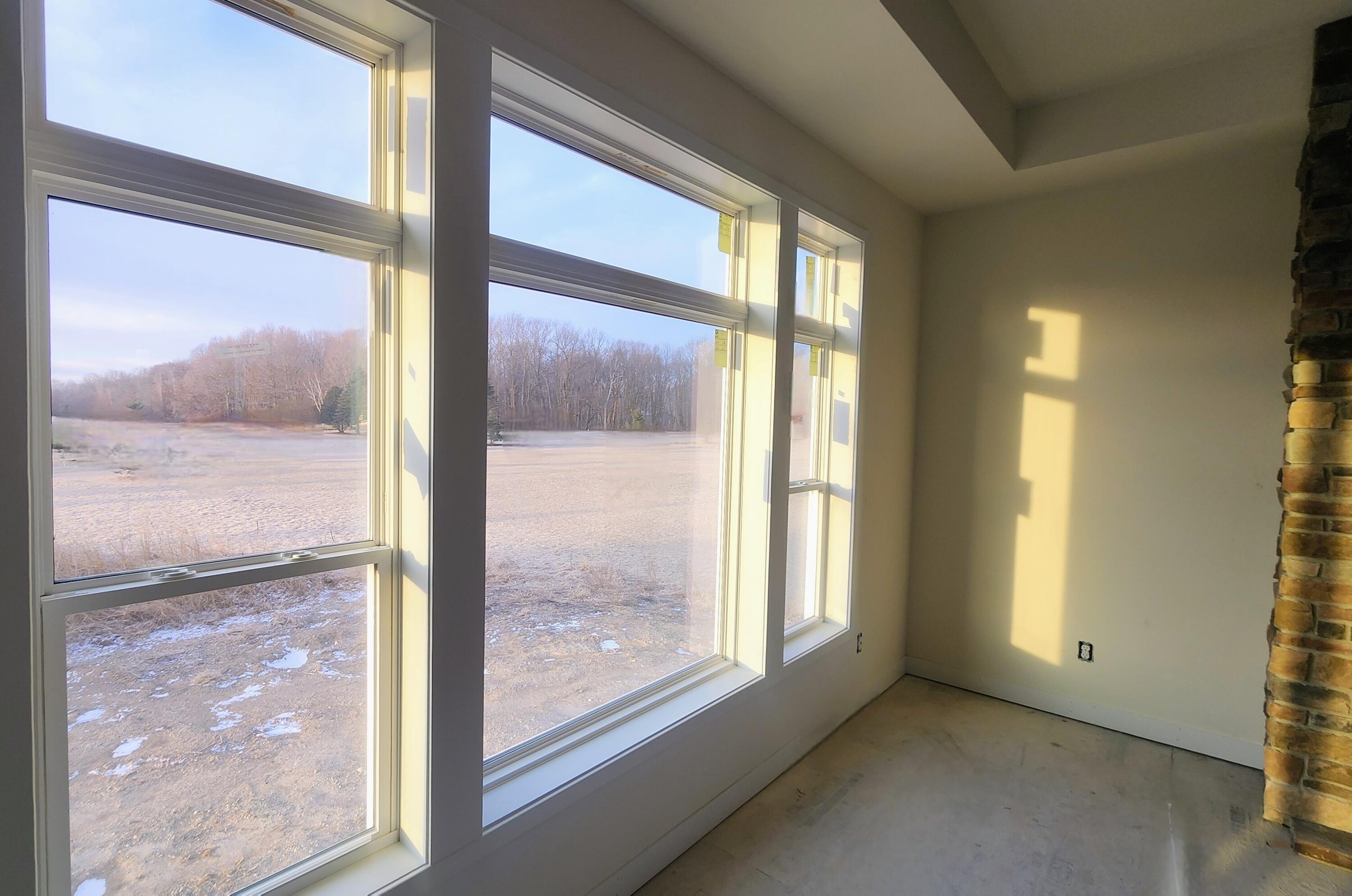 2161 Wallace Lake Road, Unit LT10 Trenton, WI 53090 - Photo 6 of 14 Walls of Tall Windows offers gorgeous sunlight flowing thru the Home