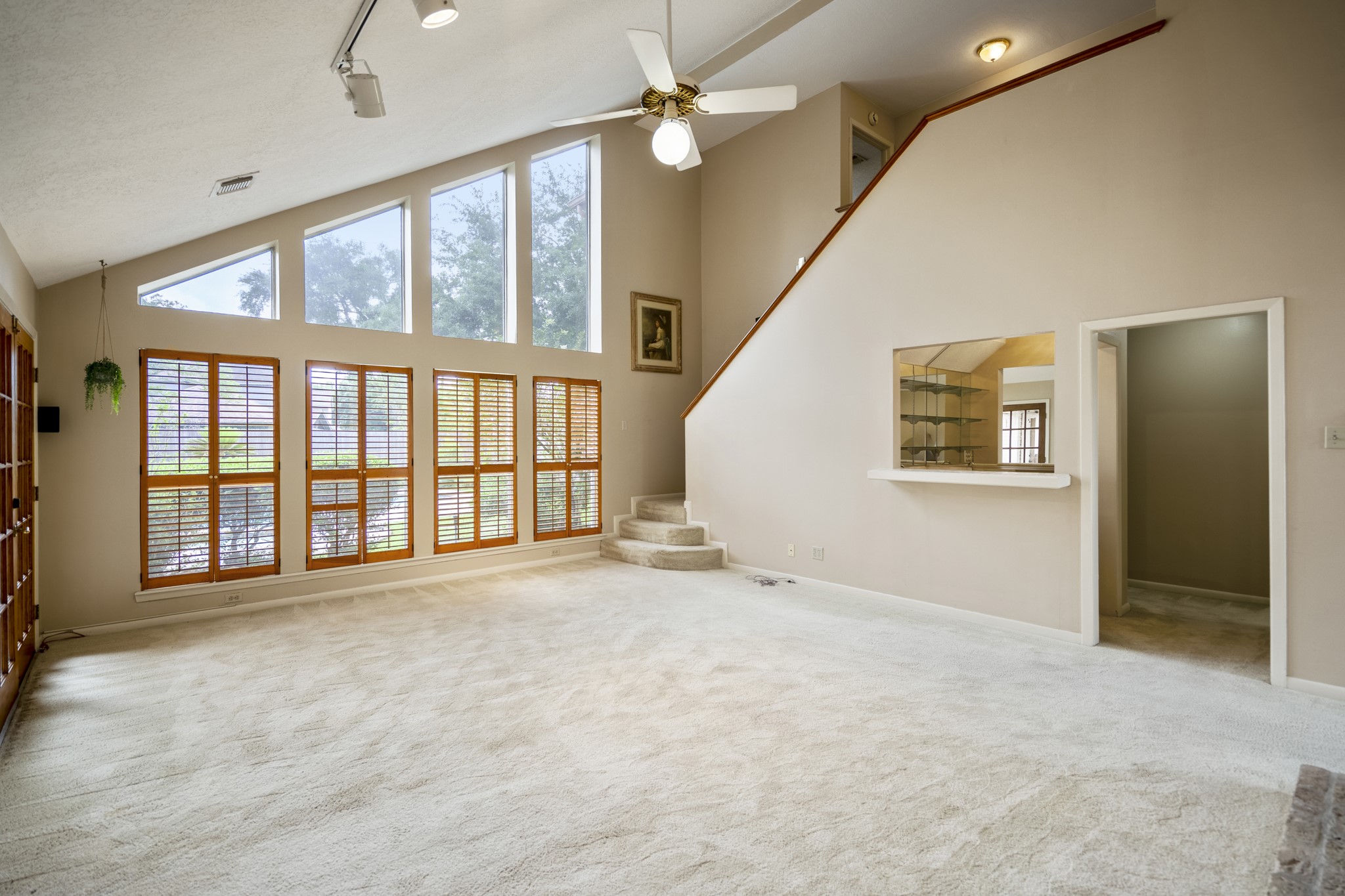 16606 Brendon Court Spring, TX 77379 - Photo 41 of 43 The open floorplan of the living space also offers lots of natural light, gas log fireplace and a wet bar.