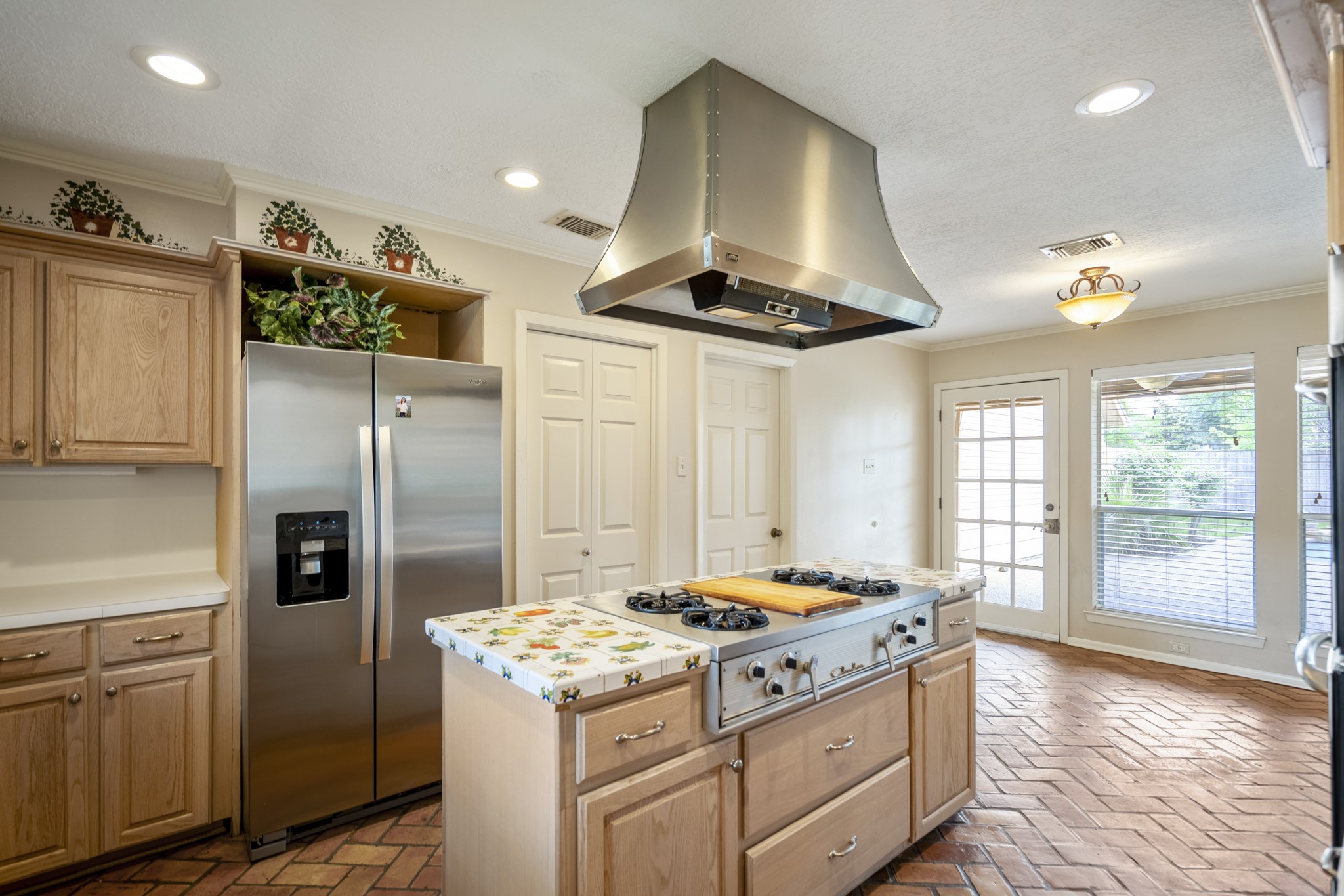 16606 Brendon Court Spring, TX 77379 - Photo 19 of 43 The kitchen opens to the breakfast room which then opens to the patio area.