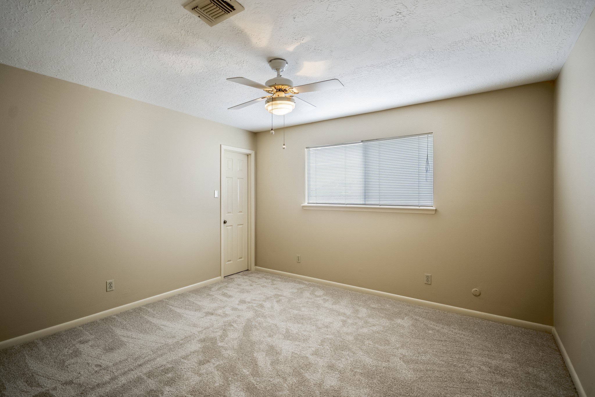 16606 Brendon Court Spring, TX 77379 - Photo 31 of 43 This is the second bedroom upstairs, with neutral tones, and a good size closet.