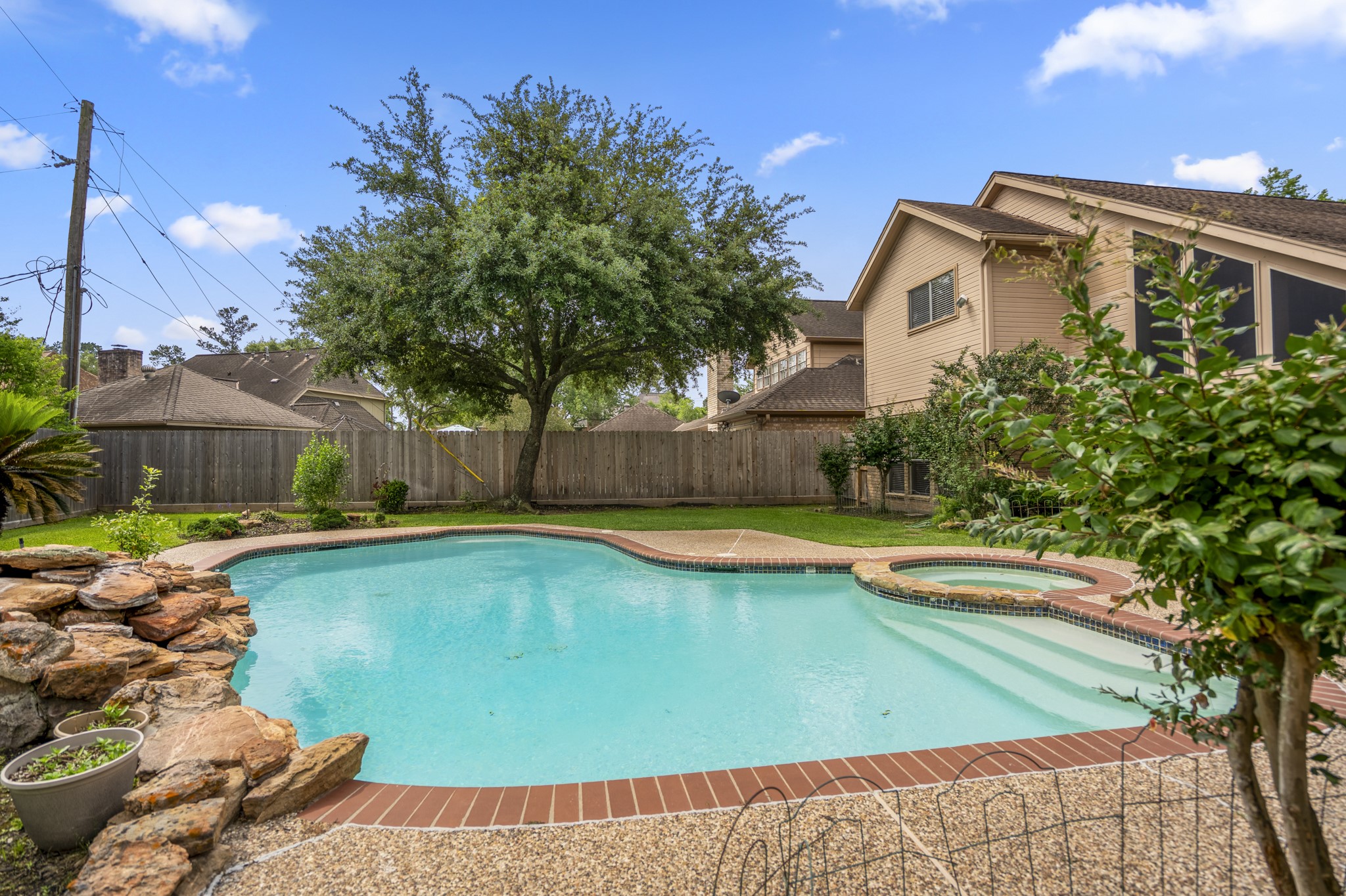 16606 Brendon Court Spring, TX 77379 - Photo 36 of 43 Here is a view of the pool and spa, where you can see you still have plenty of yard space for children and pets to play.