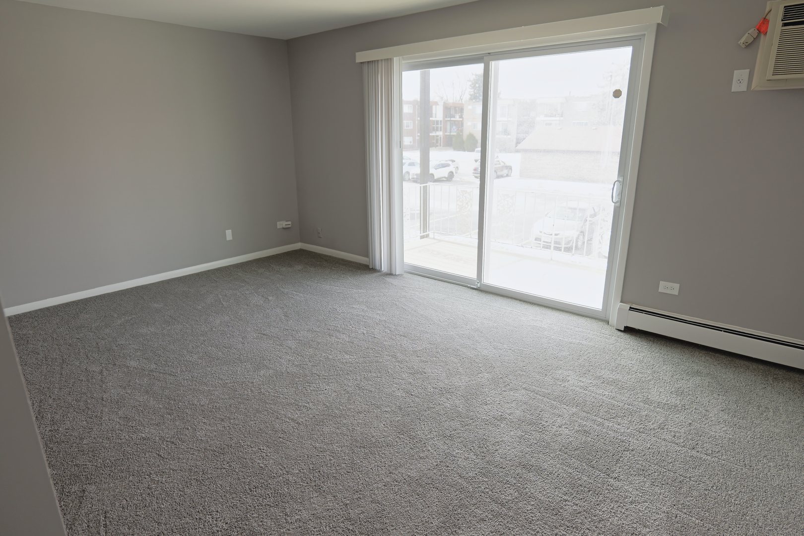 12630 South Alpine Drive, Unit 7 Alsip, IL 60803 - Photo 3 of 9 a view of an empty room with a window