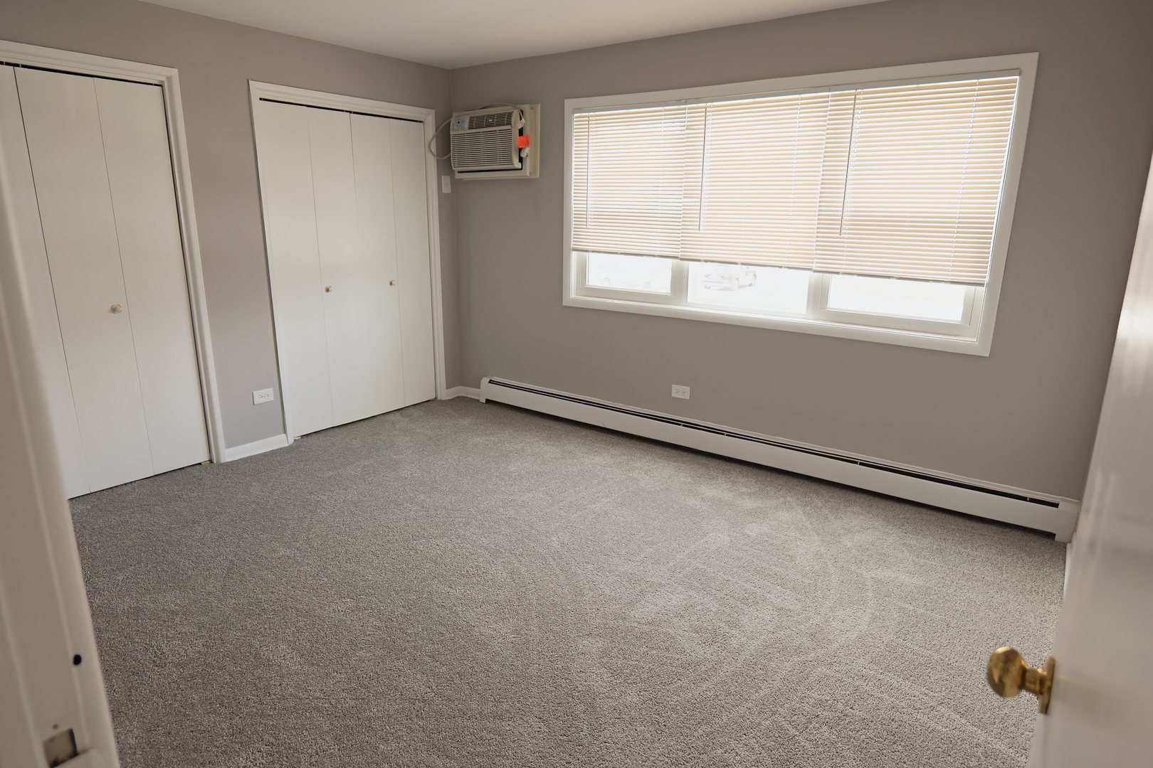 12630 South Alpine Drive, Unit 7 Alsip, IL 60803 - Photo 8 of 9 an empty room with a window