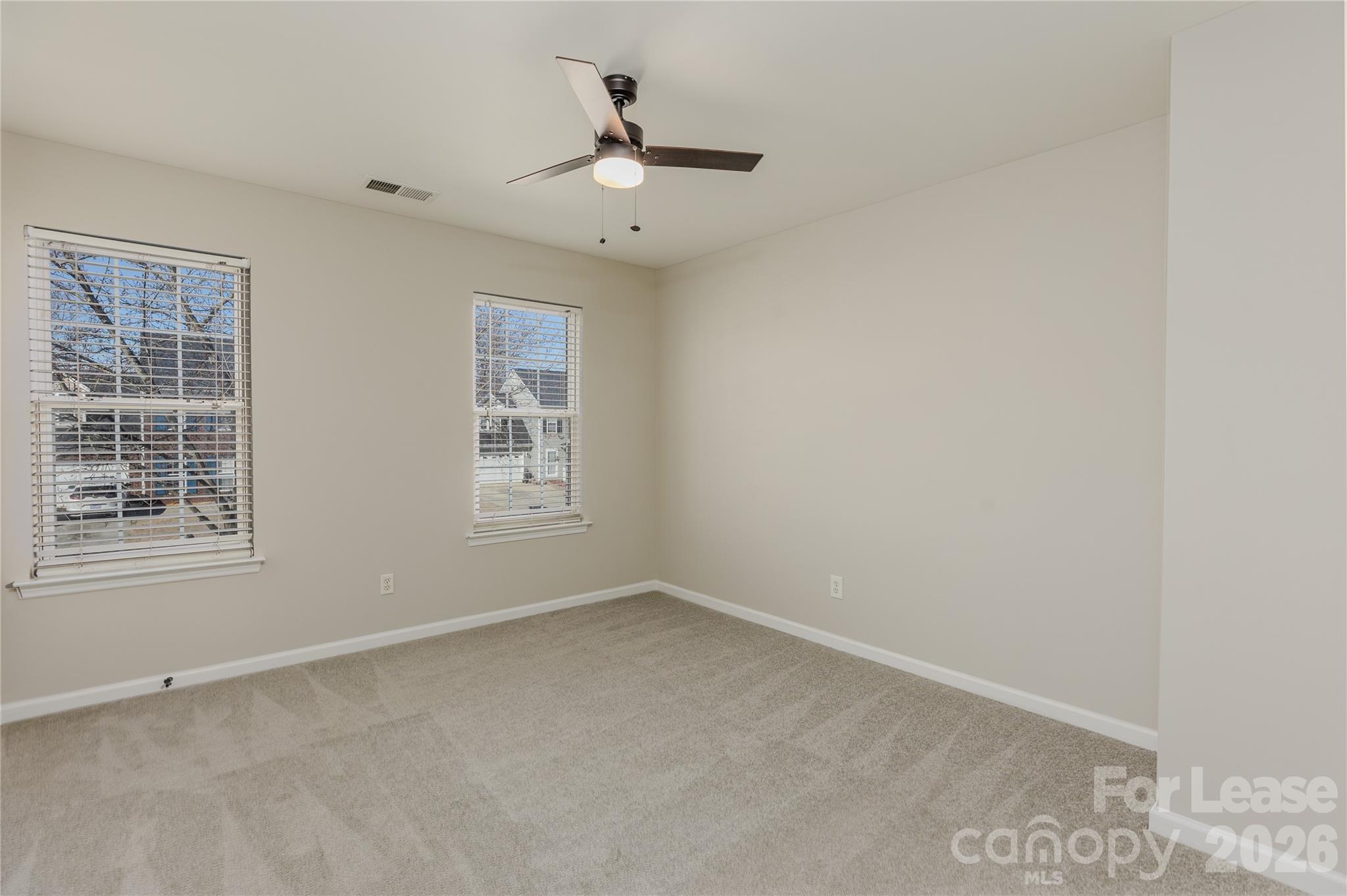 9724 Steele Meadow Road Charlotte, NC 28273 - Photo 20 of 38 a view of an empty room with a window