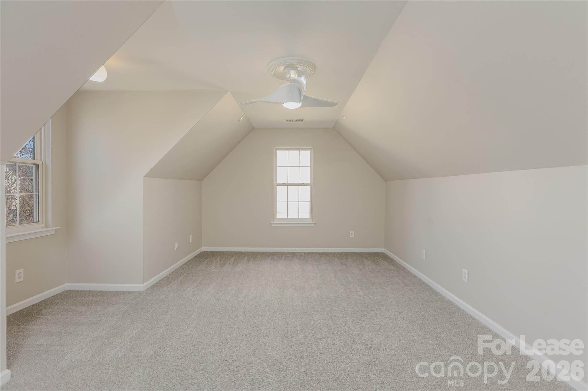 9724 Steele Meadow Road Charlotte, NC 28273 - Photo 21 of 38 an empty room with a empty space and windows