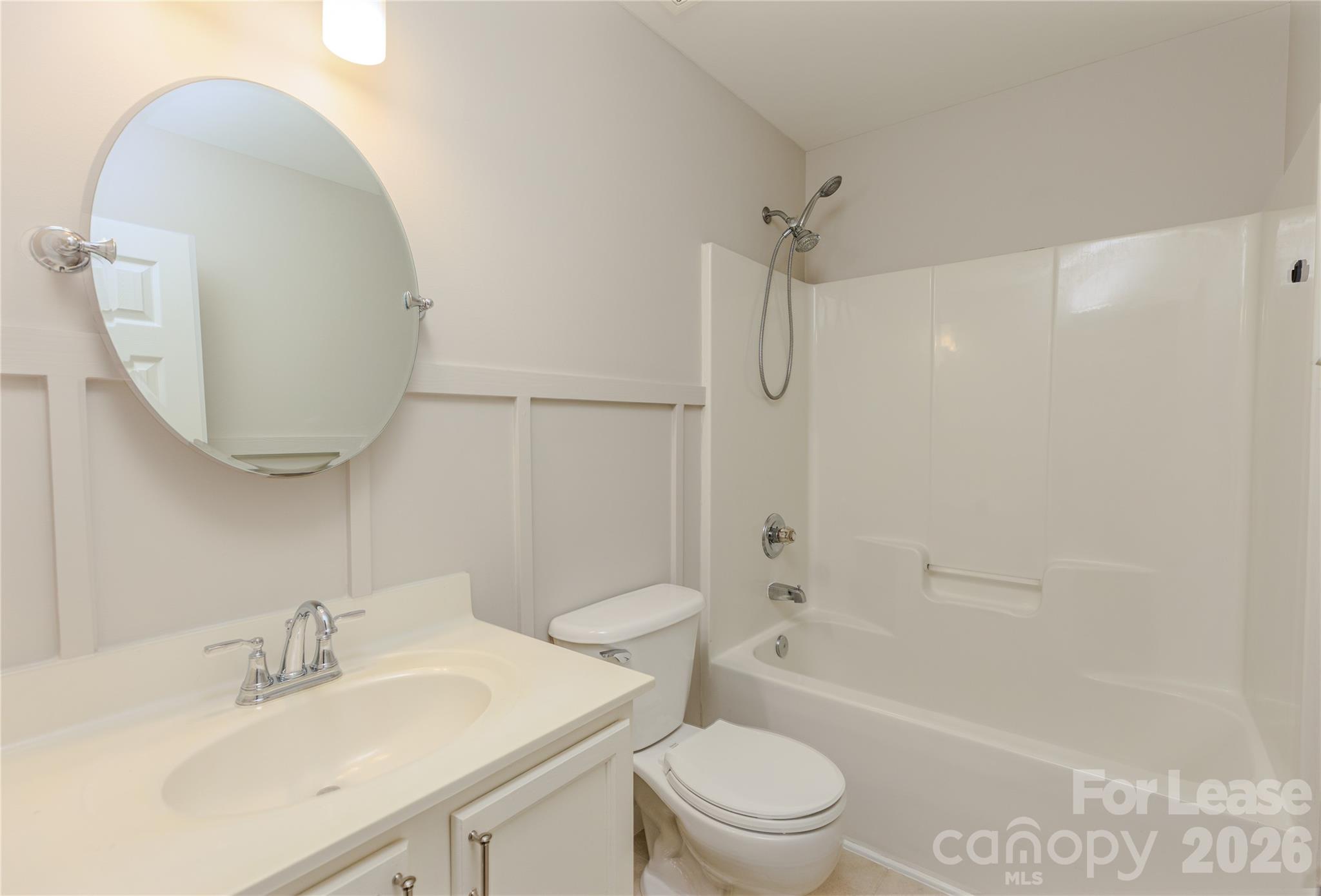 9724 Steele Meadow Road Charlotte, NC 28273 - Photo 25 of 38 a bathroom with a sink toilet and shower