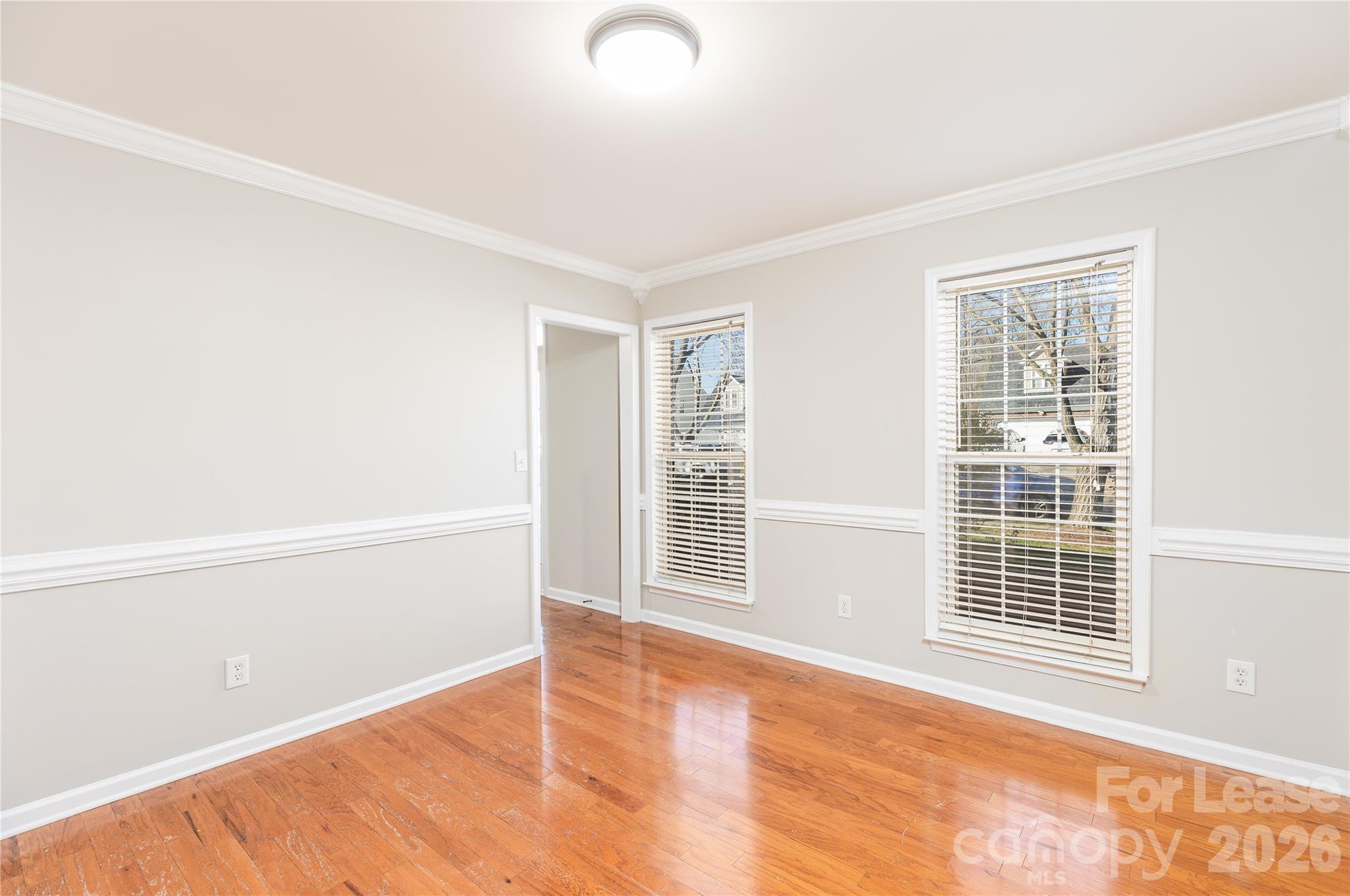 9724 Steele Meadow Road Charlotte, NC 28273 - Photo 8 of 38 a view of an empty room with a window
