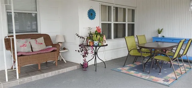 a view of a dining room with furniture