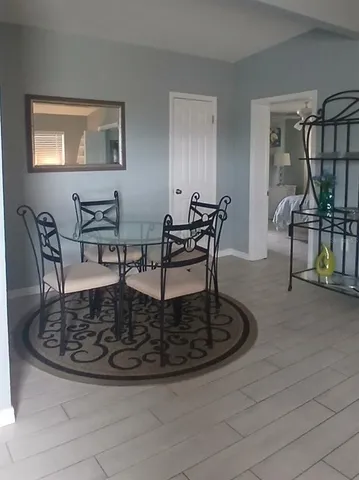 a view of a dining room with furniture