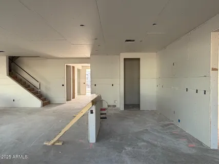 a view of a hallway to closet