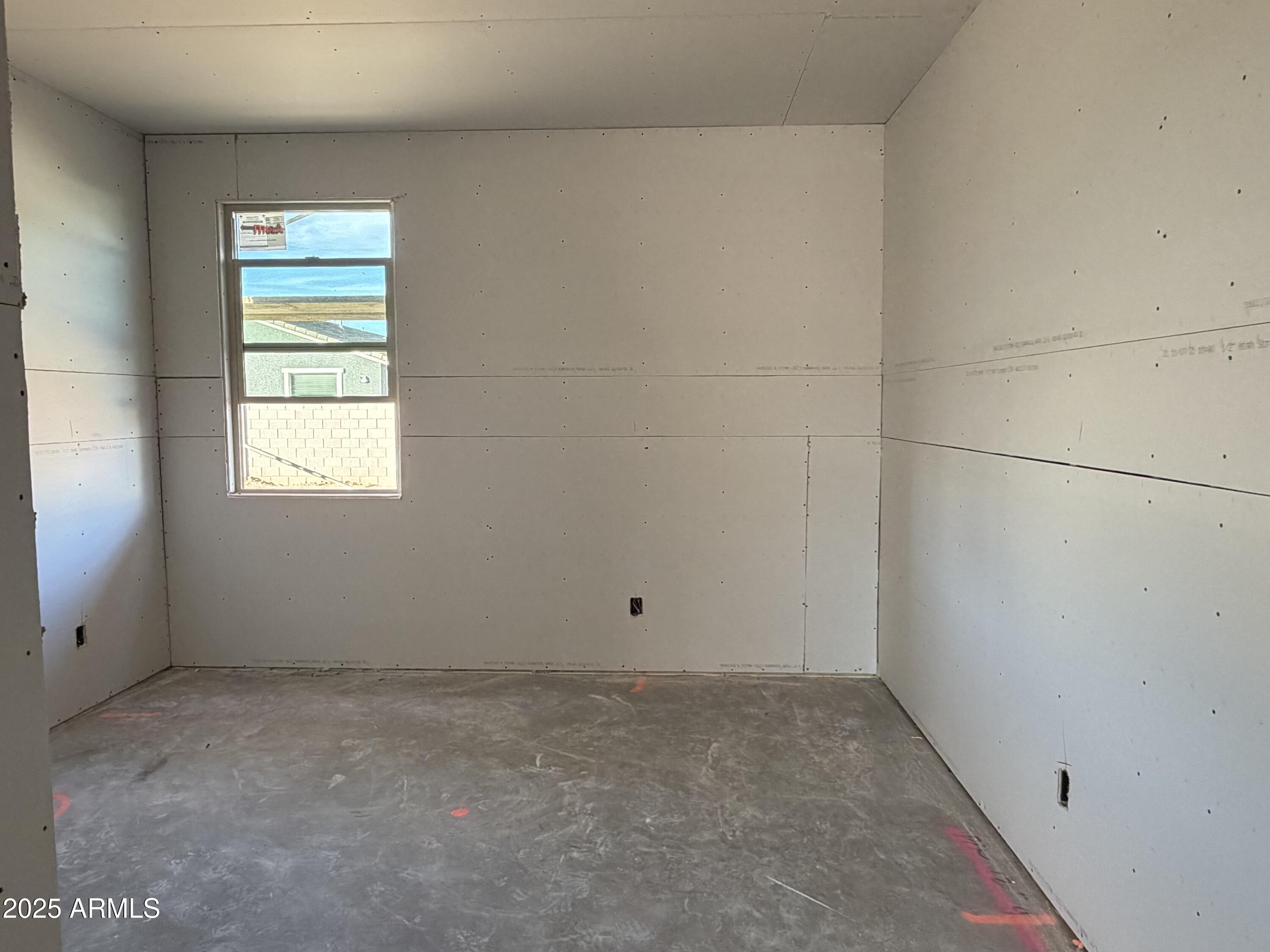 5518 West Hayduk Road Laveen, AZ 85339 - Photo 13 of 35 an empty room with a window
