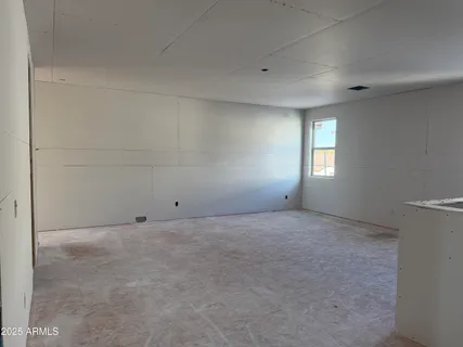 a view of an empty room with window