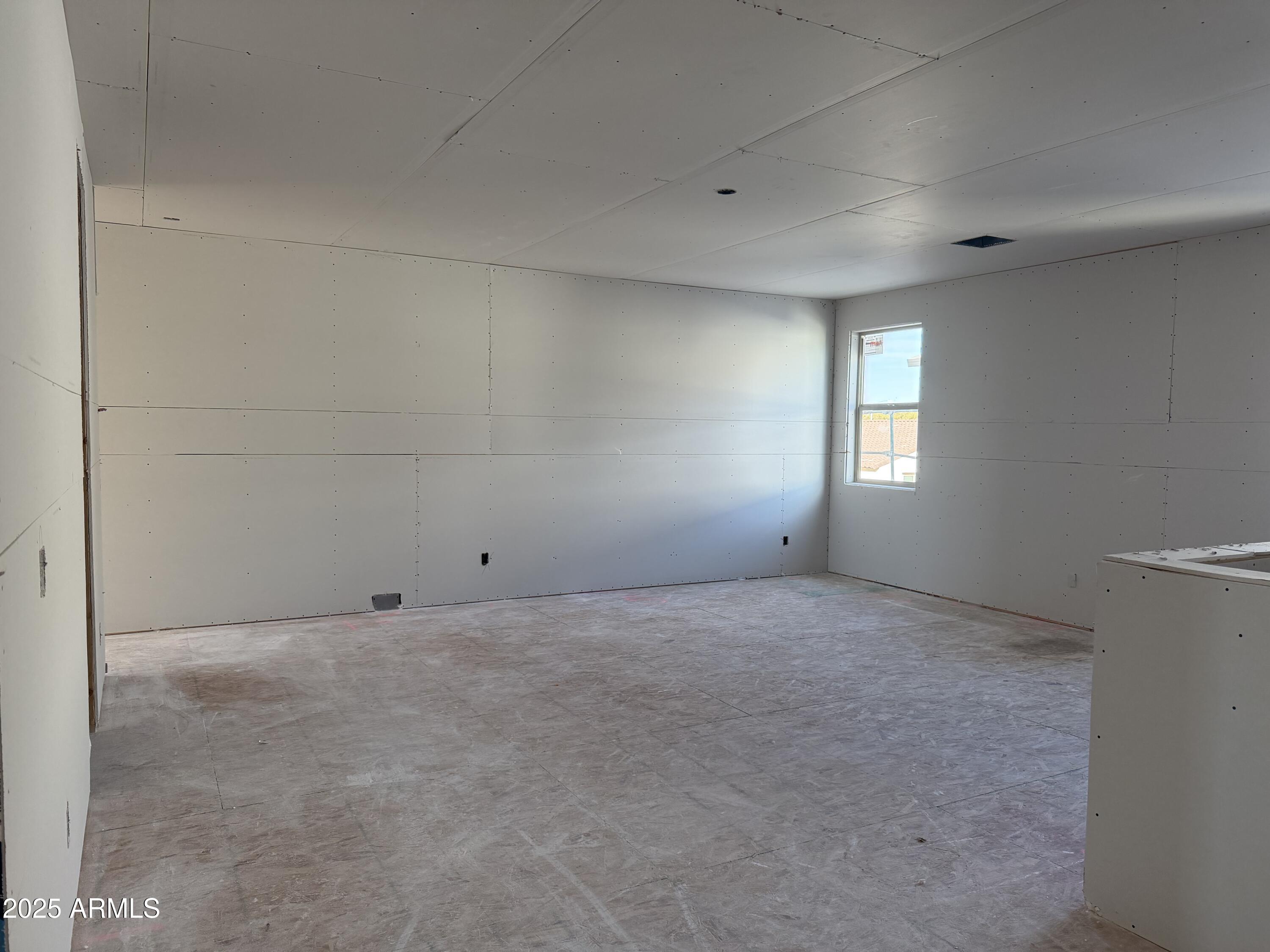 5518 West Hayduk Road Laveen, AZ 85339 - Photo 15 of 35 a view of an empty room with a window