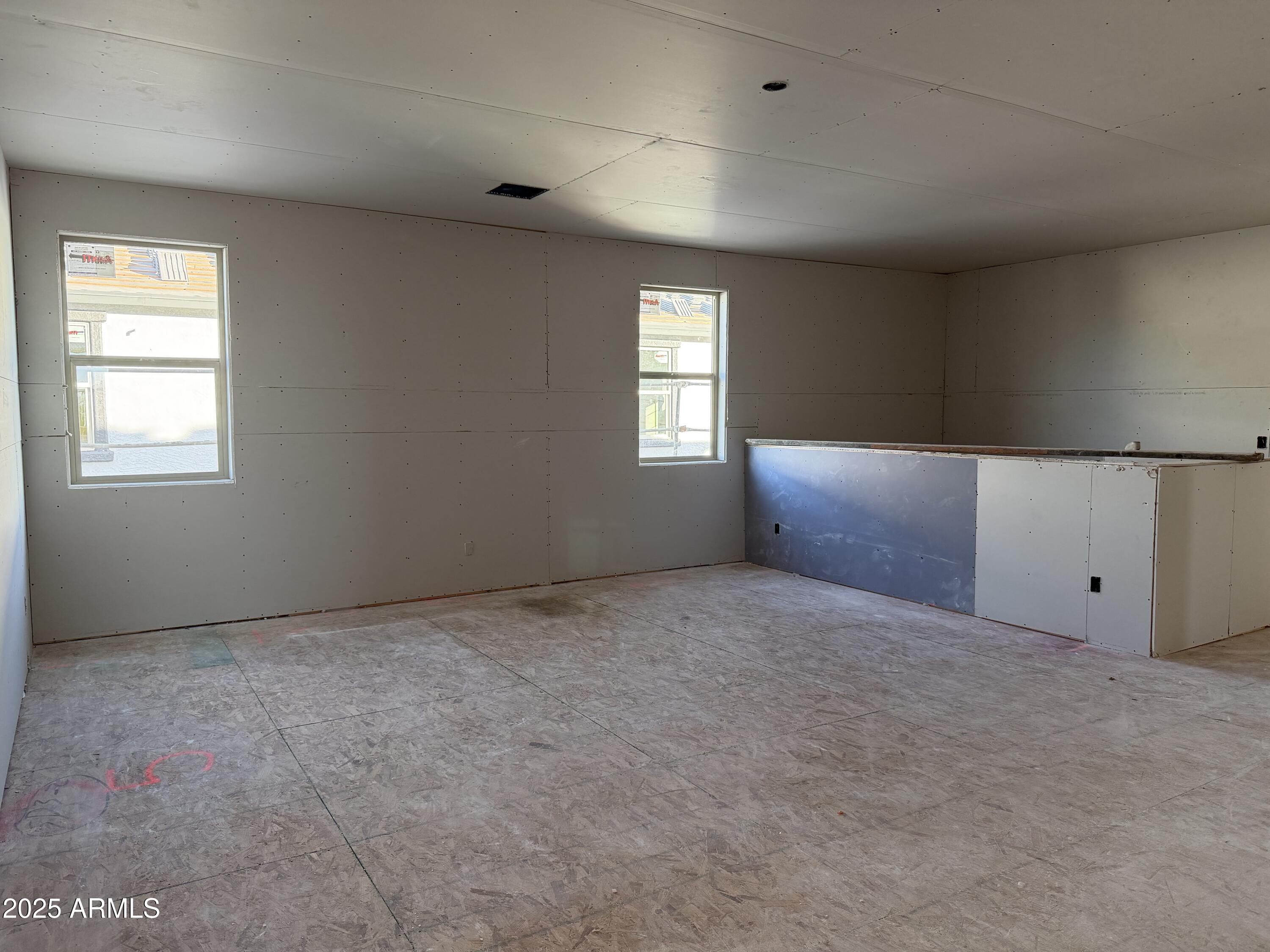 5518 West Hayduk Road Laveen, AZ 85339 - Photo 17 of 35 a view of an empty room with window