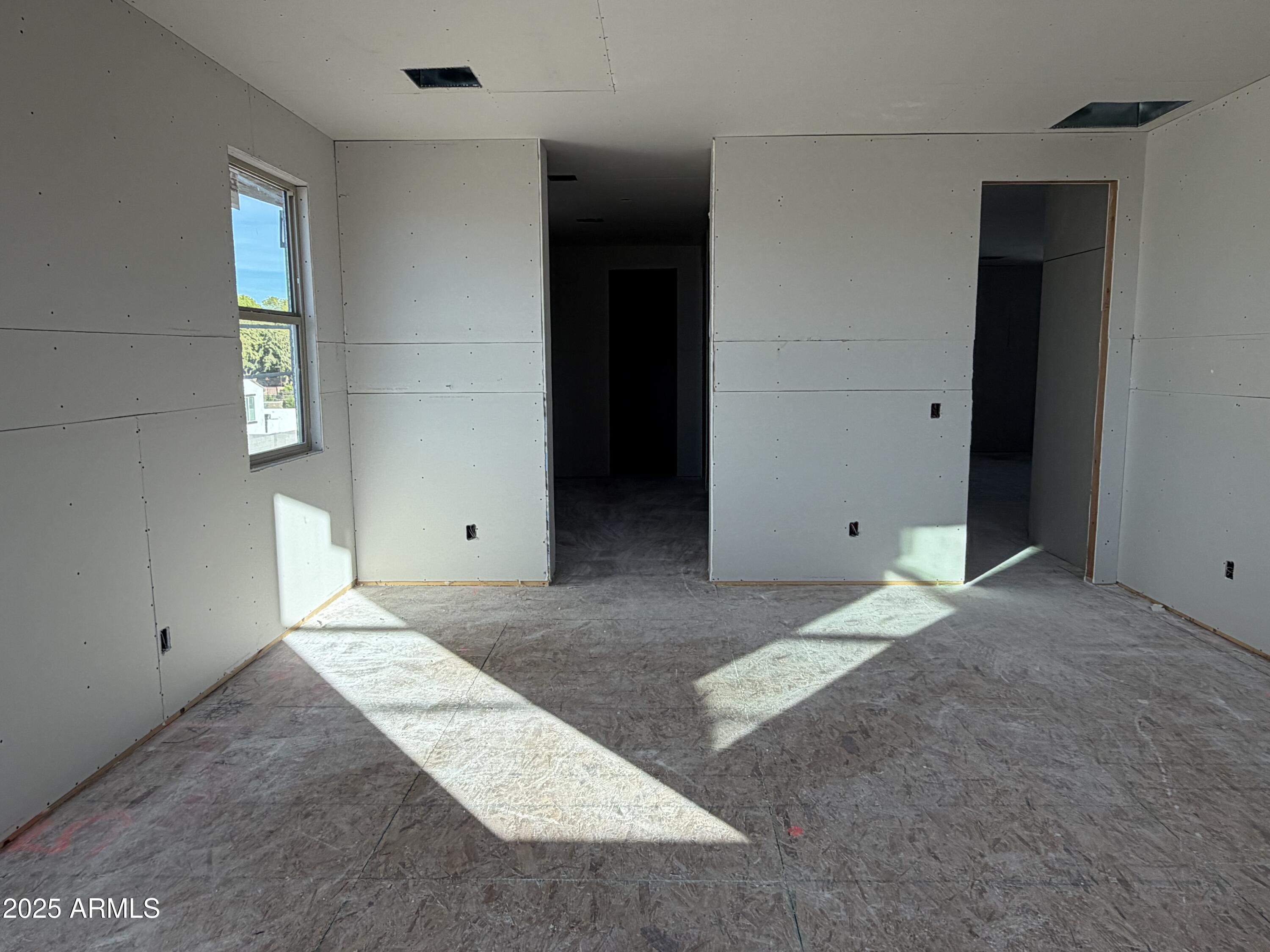 5518 West Hayduk Road Laveen, AZ 85339 - Photo 20 of 35 an empty room with windows