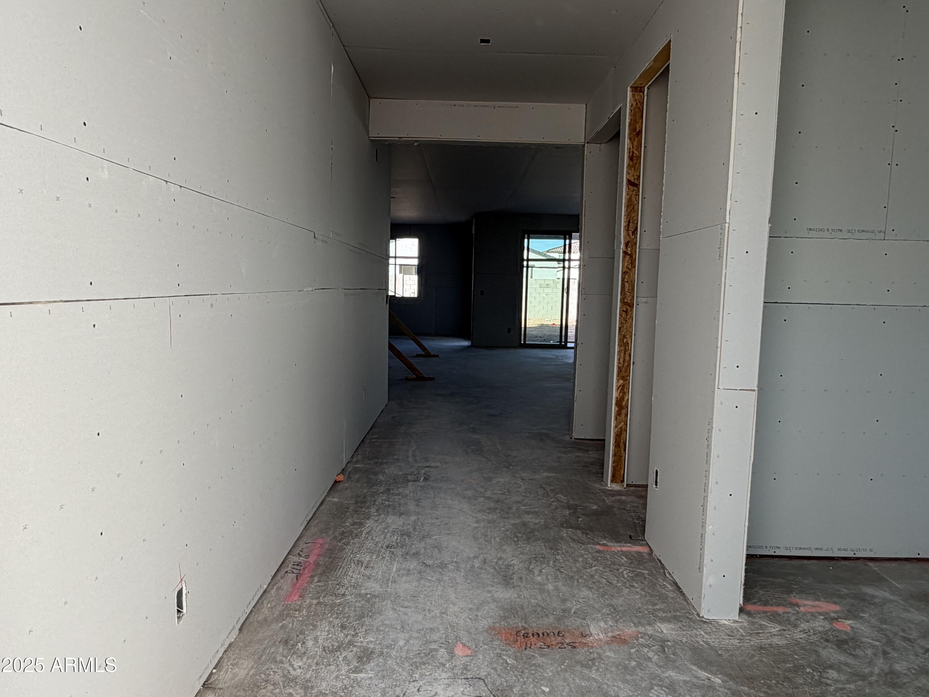 5518 West Hayduk Road Laveen, AZ 85339 - Photo 3 of 35 a view of a hallway with wooden floor and closet