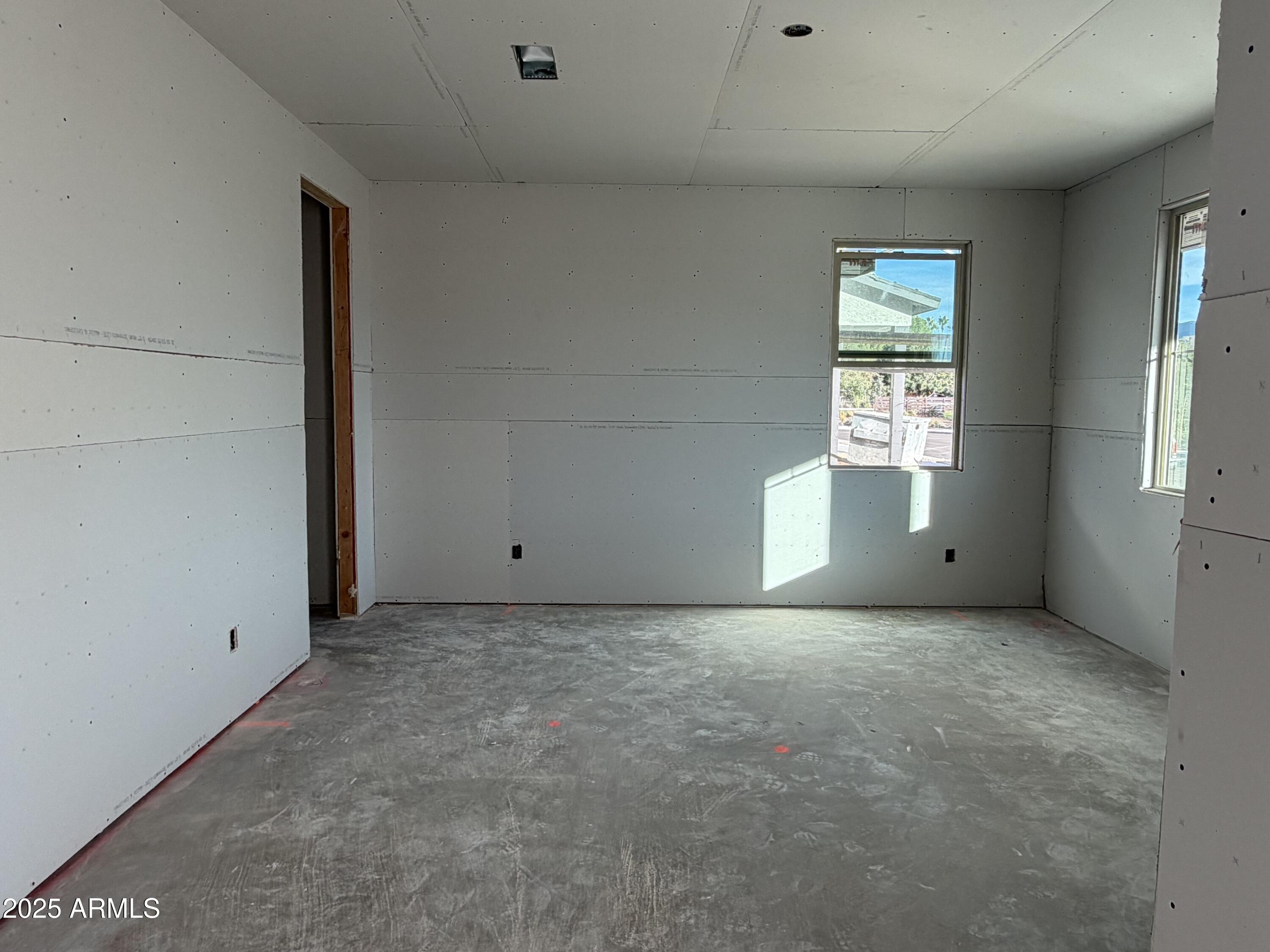 5518 West Hayduk Road Laveen, AZ 85339 - Photo 4 of 35 an empty room with windows