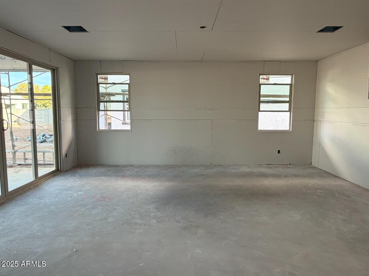 5518 West Hayduk Road Laveen, AZ 85339 - Photo 7 of 35 an empty room with windows