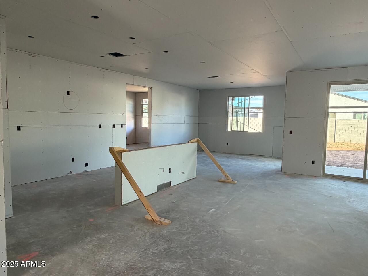 5518 West Hayduk Road Laveen, AZ 85339 - Photo 9 of 35 an empty room with windows