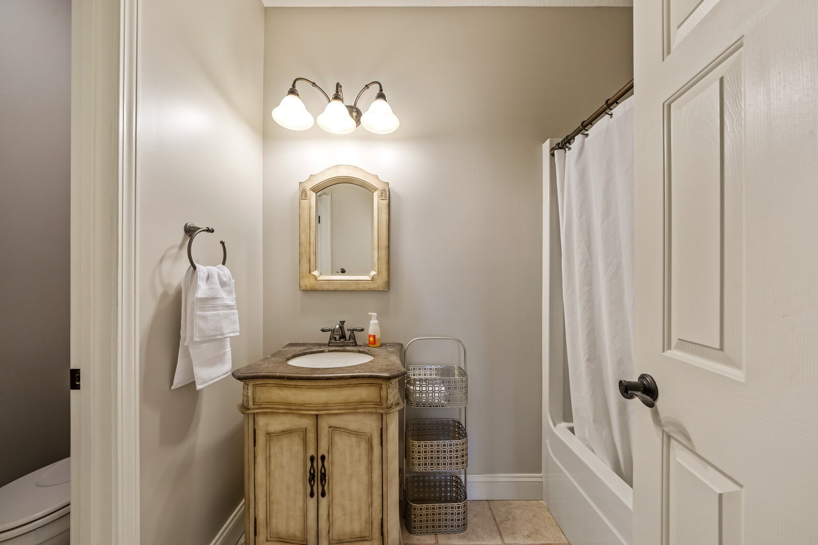 839 Corolla Road Sparta, TN 38583 - Photo 14 of 50 a bathroom with a sink a mirror and a shower