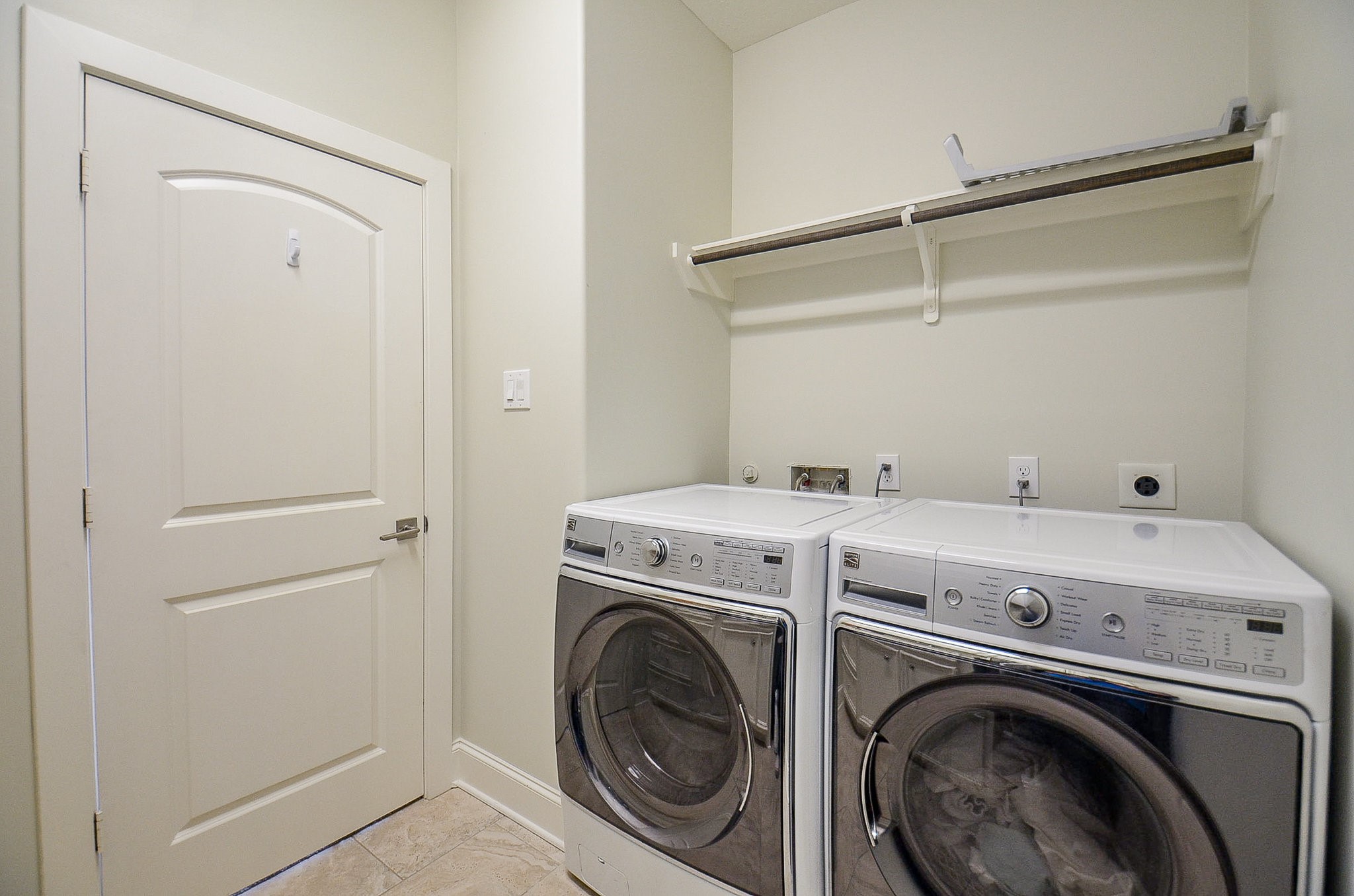 4625 Maple Street Bellaire, TX 77401 - Photo 42 of 47 a utility room with dryer and washer
