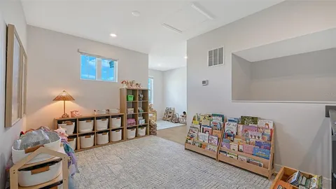 a bed room with a bed and a couch