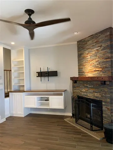 a kitchen with stainless steel appliances granite countertop a stove and a refrigerator