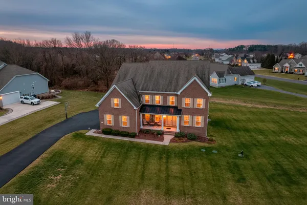 a view of a house with a big yard