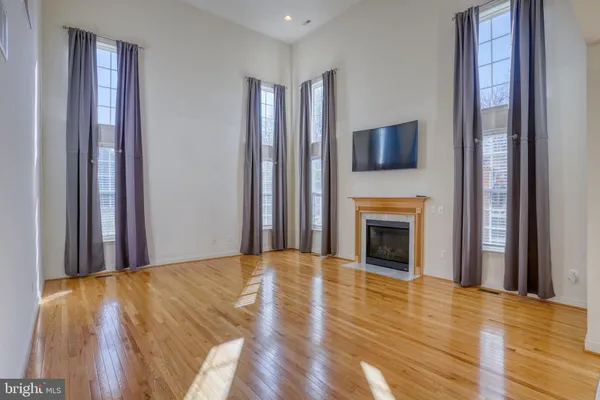 a view of a dining room with furniture and window