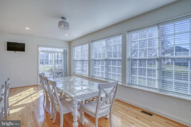 a view of an empty room with a fireplace