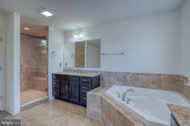 a view of a swimming pool with a yard