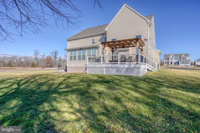 a view of a swimming pool and lounge chair