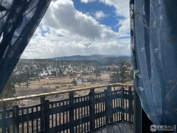 a view of a city from a balcony