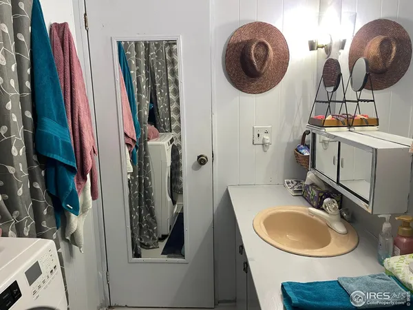 a view of a hallway with windows