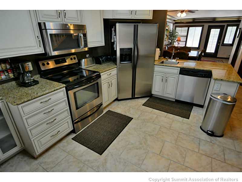 1944 Soda Ridge Road Keystone, CO 80435 - Photo 14 of 25 a kitchen with a sink appliances and cabinets