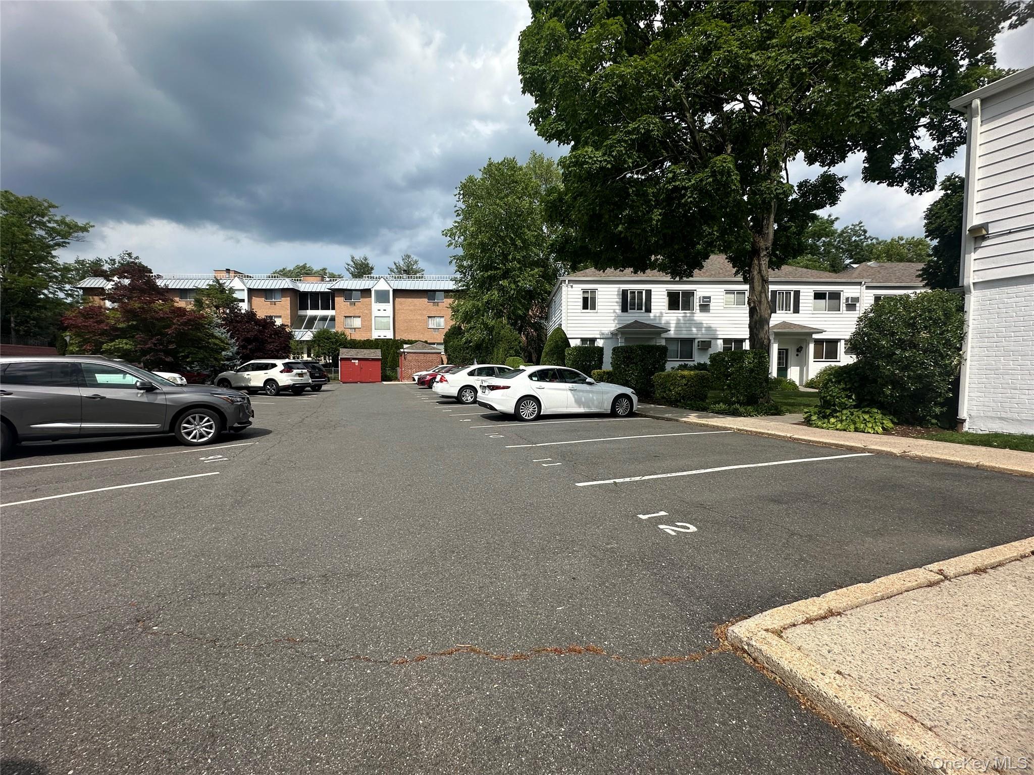 129 Fenimore Road, Unit 129B Mamaroneck, NY 10543 - Photo 14 of 19 Private parking lot at back of community. #129 is first building. Walk to your car in seconds.