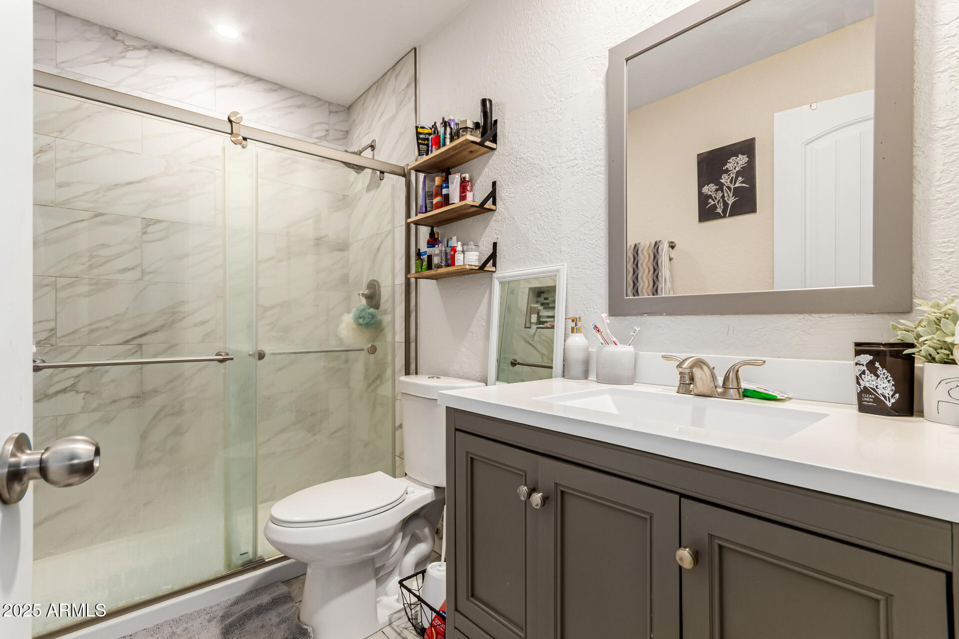 677 West 22nd Avenue Apache Junction, AZ 85120 - Photo 5 of 21 a bathroom with a sink toilet and shower