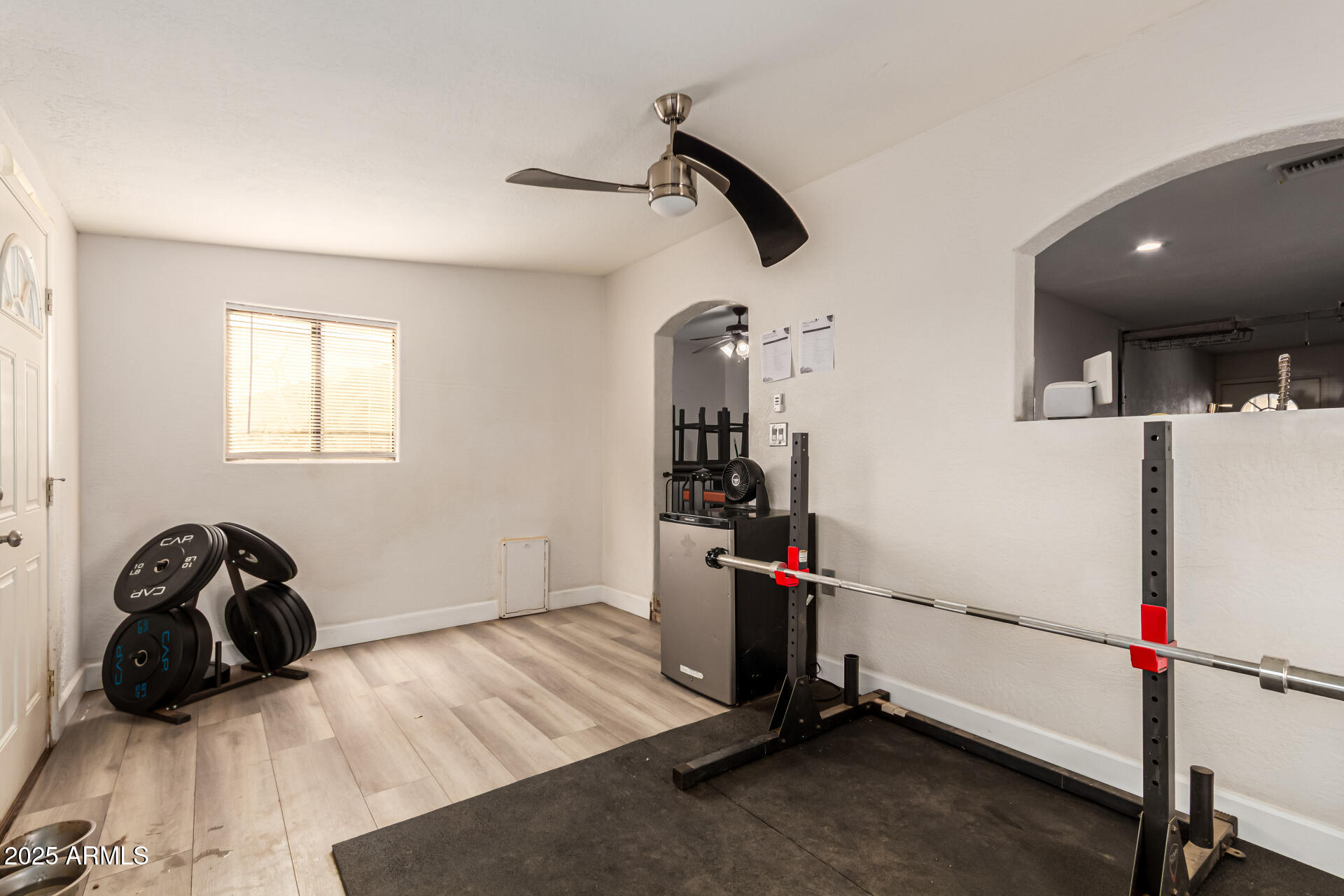 677 West 22nd Avenue Apache Junction, AZ 85120 - Photo 7 of 21 a view of a room with gym equipment