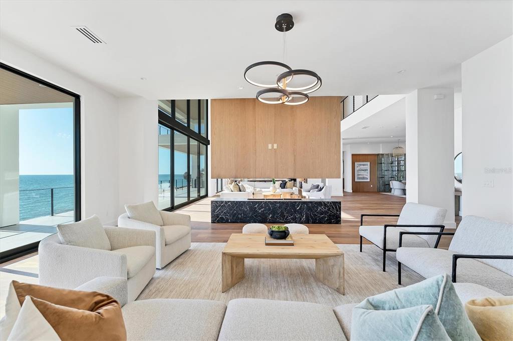 4005 Casey Key Road Nokomis, FL 34275 - Photo 19 of 84 a living room with furniture and a large window