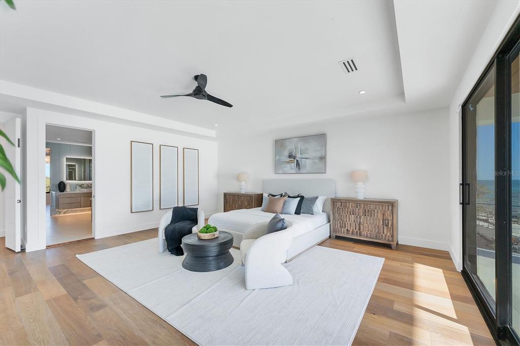 4005 Casey Key Road Nokomis, FL 34275 - Photo 25 of 84 a living room with furniture and wooden floor