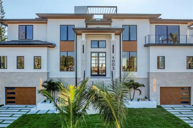 a living room with furniture fireplace and a rug
