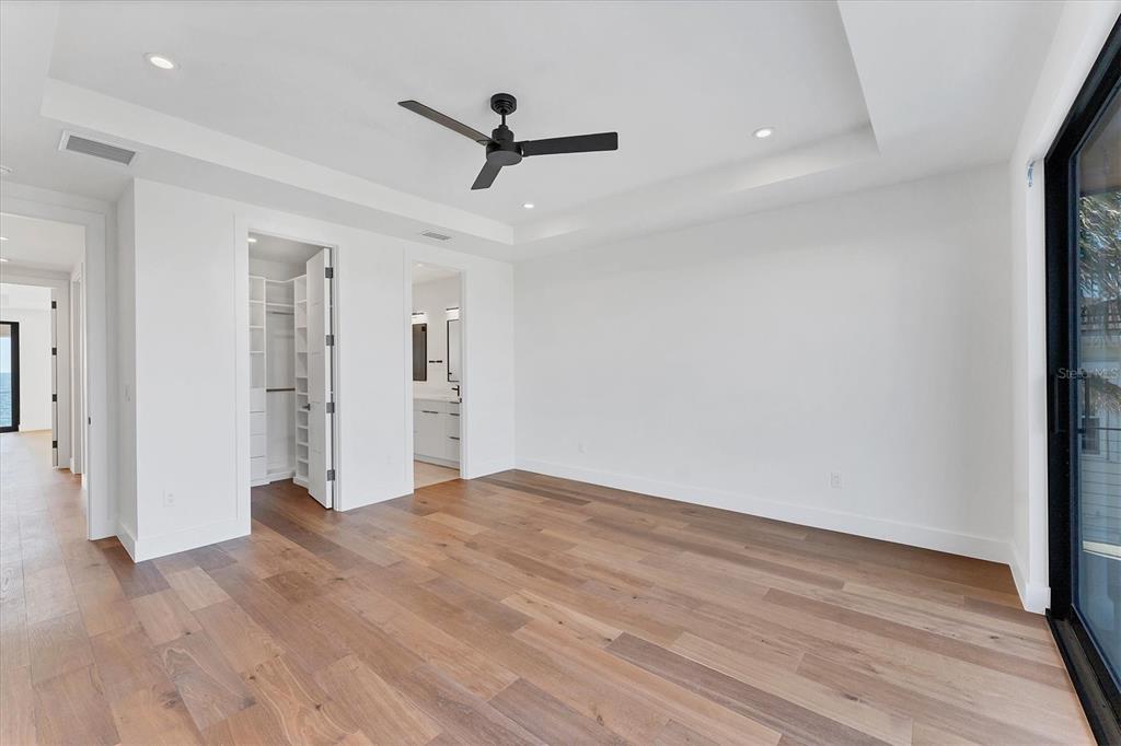4005 Casey Key Road Nokomis, FL 34275 - Photo 49 of 84 a view of empty room with wooden floor