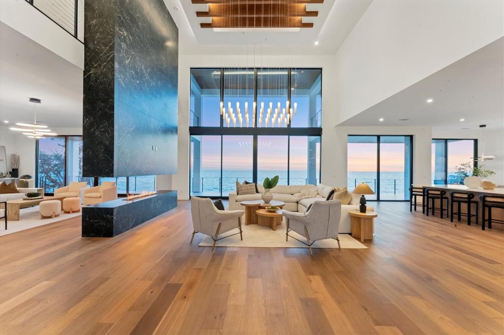 4005 Casey Key Road Nokomis, FL 34275 - Photo 68 of 84 a living room with furniture and large windows