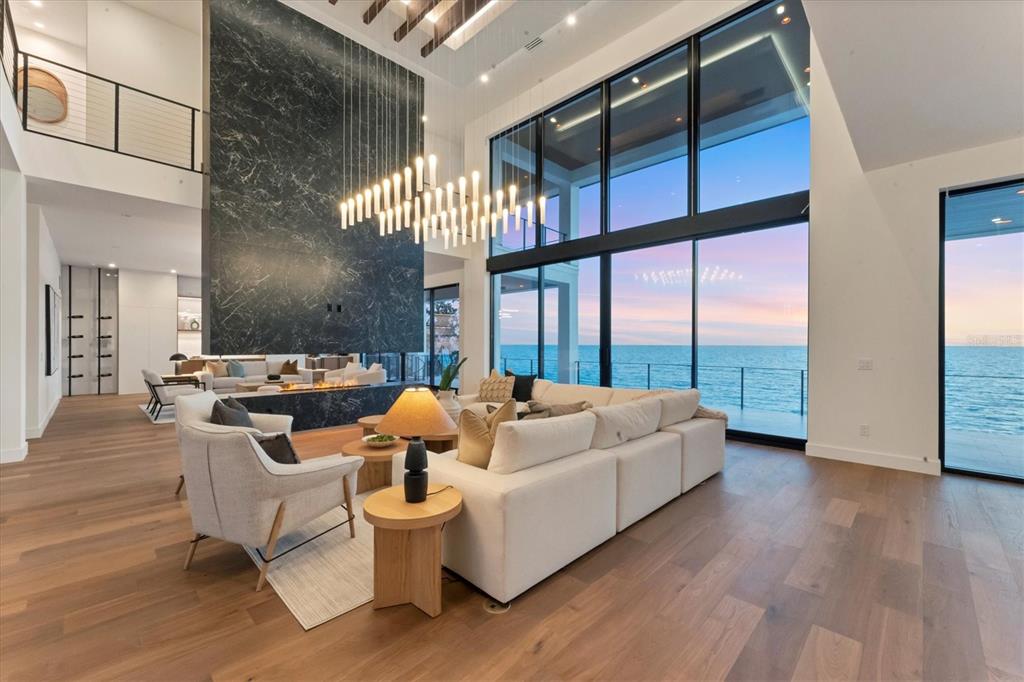 4005 Casey Key Road Nokomis, FL 34275 - Photo 70 of 84 a living room with furniture and a large window