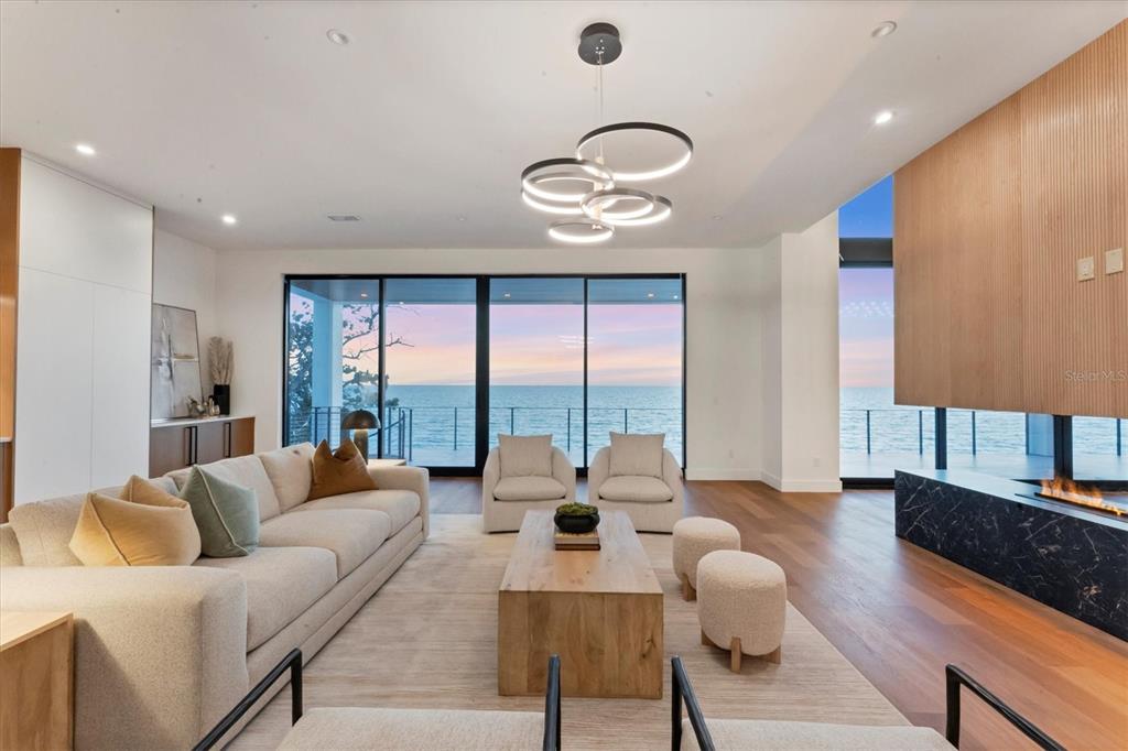 4005 Casey Key Road Nokomis, FL 34275 - Photo 74 of 84 a living room with furniture and a large window