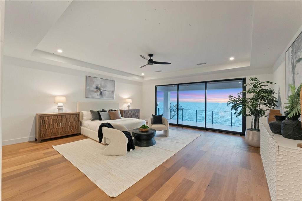 4005 Casey Key Road Nokomis, FL 34275 - Photo 75 of 84 a living room with furniture potted plant and a large window