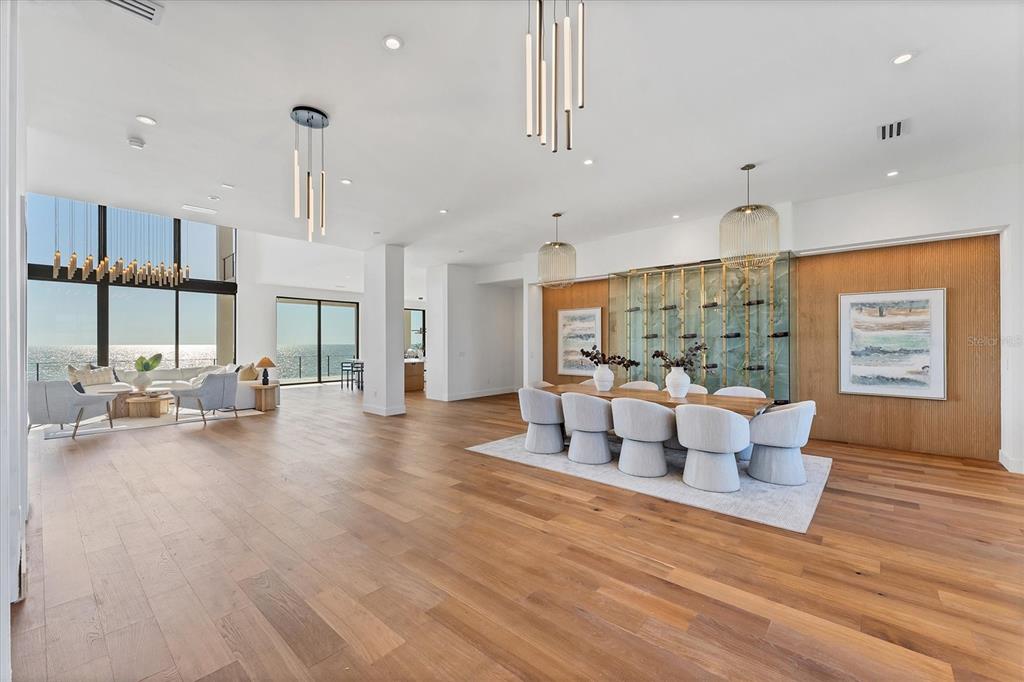 4005 Casey Key Road Nokomis, FL 34275 - Photo 9 of 84 a living room with fireplace furniture and a wooden floor